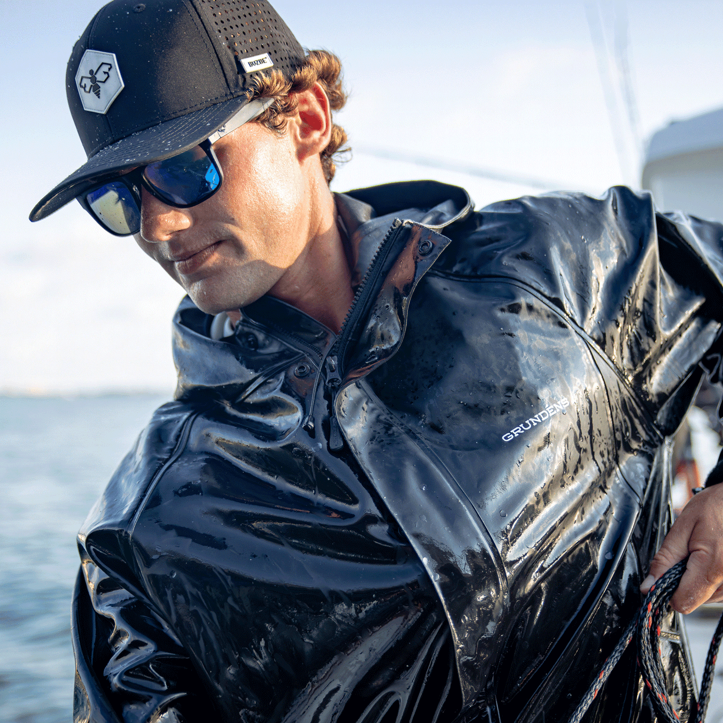 Bee Logo Performance Trucker Hat - Black